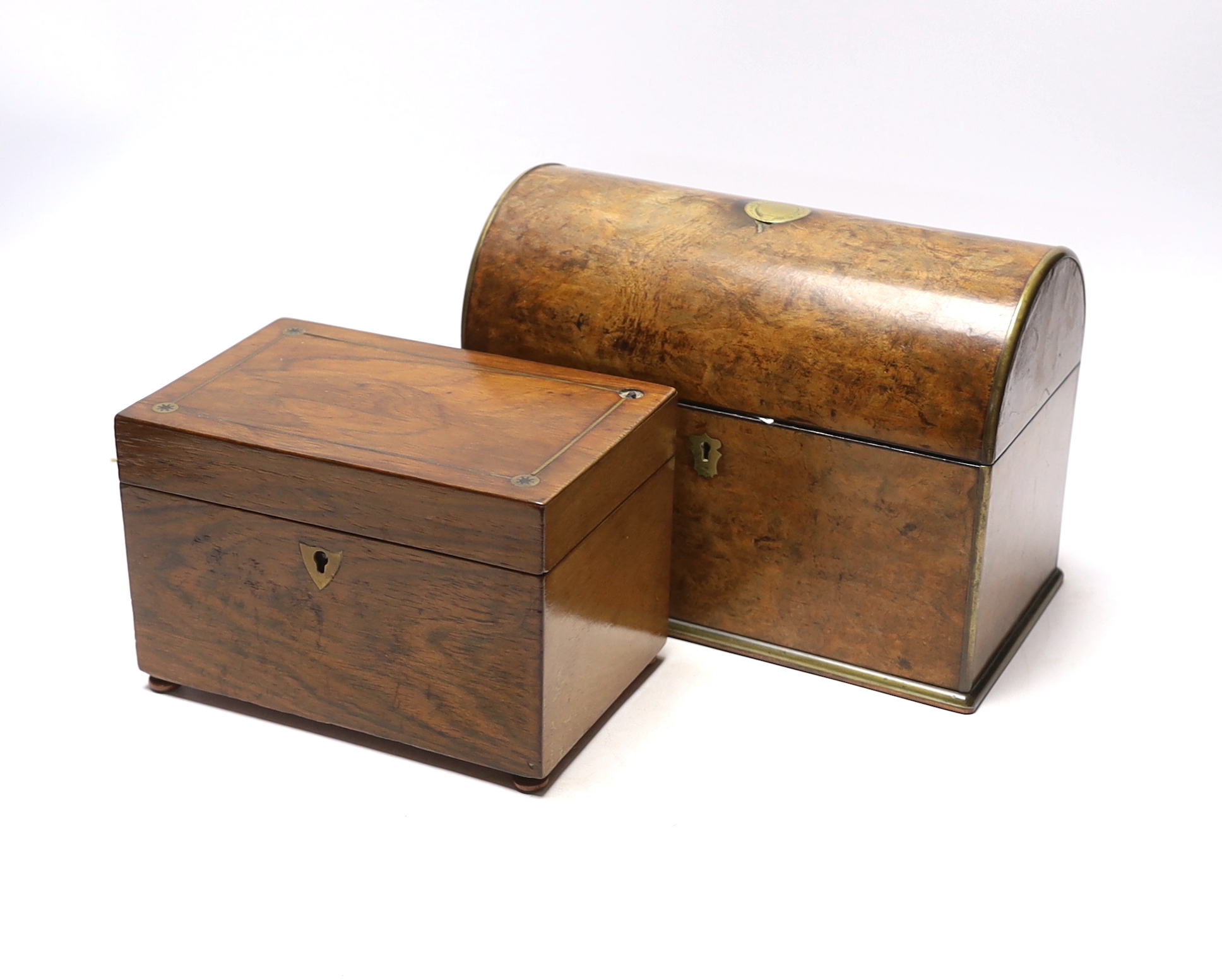 A Victorian burr walnut brass inlaid domed topped tea caddy with domed top interior and a brass inlaid rosewood tea caddy, largest 25cm wide